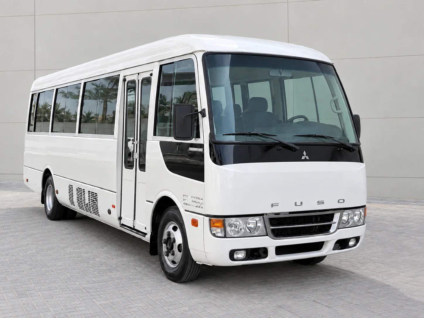 26-seater Rosa minibus with driver in Dubai by Abdul Aziz Tourism LLC